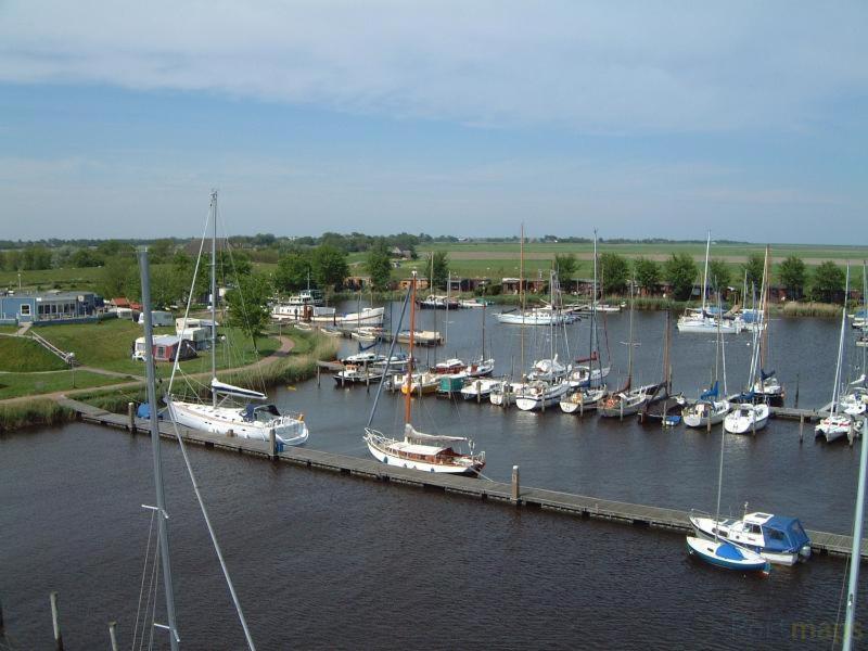 Bellemare Bungalow Lauwersmeer Mit Ueberdachte Veranda Und Eingezaeuntem Garten Anjum Екстериор снимка